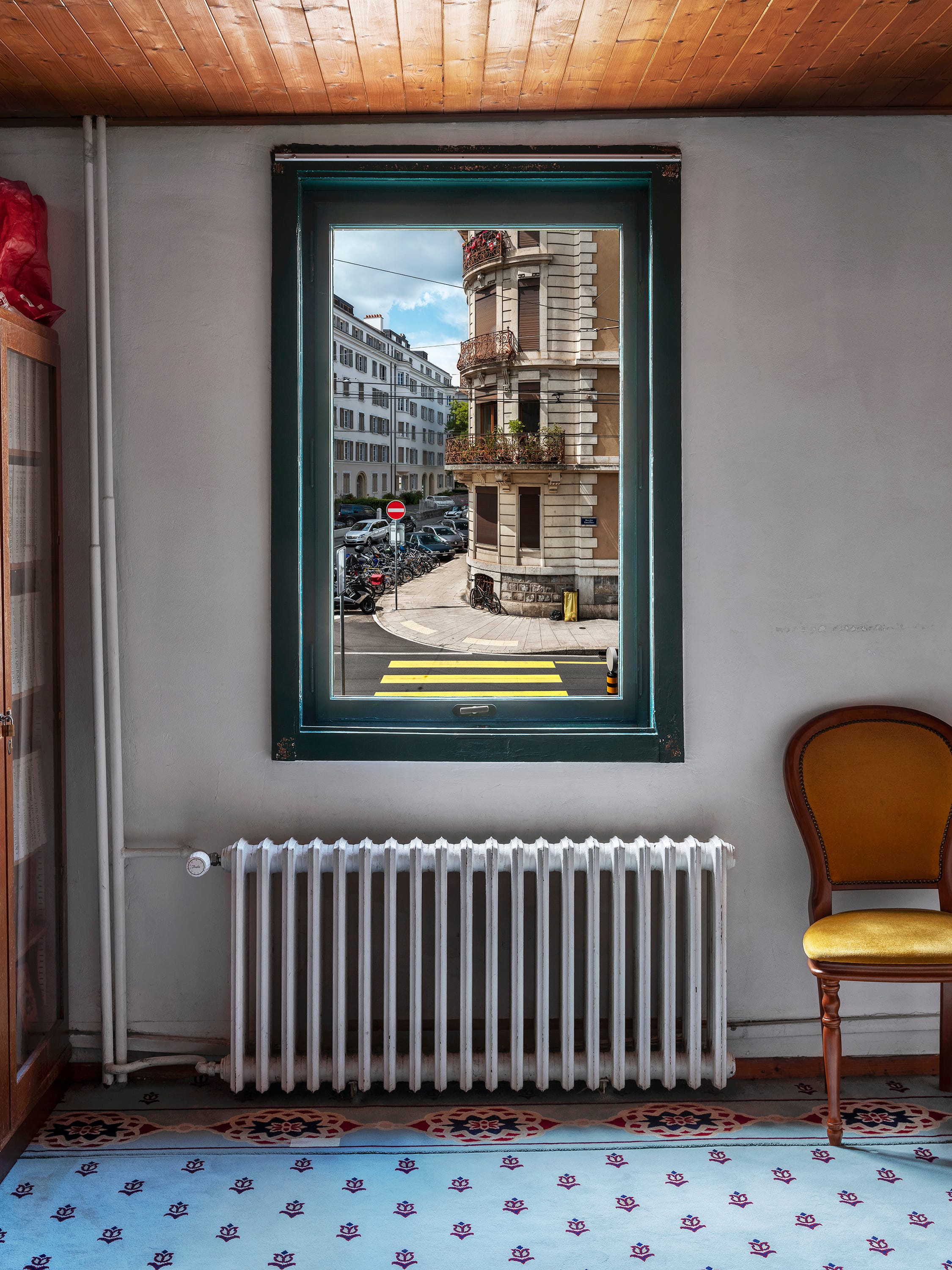 View from inside a mosque onto a Swiss urban landscape