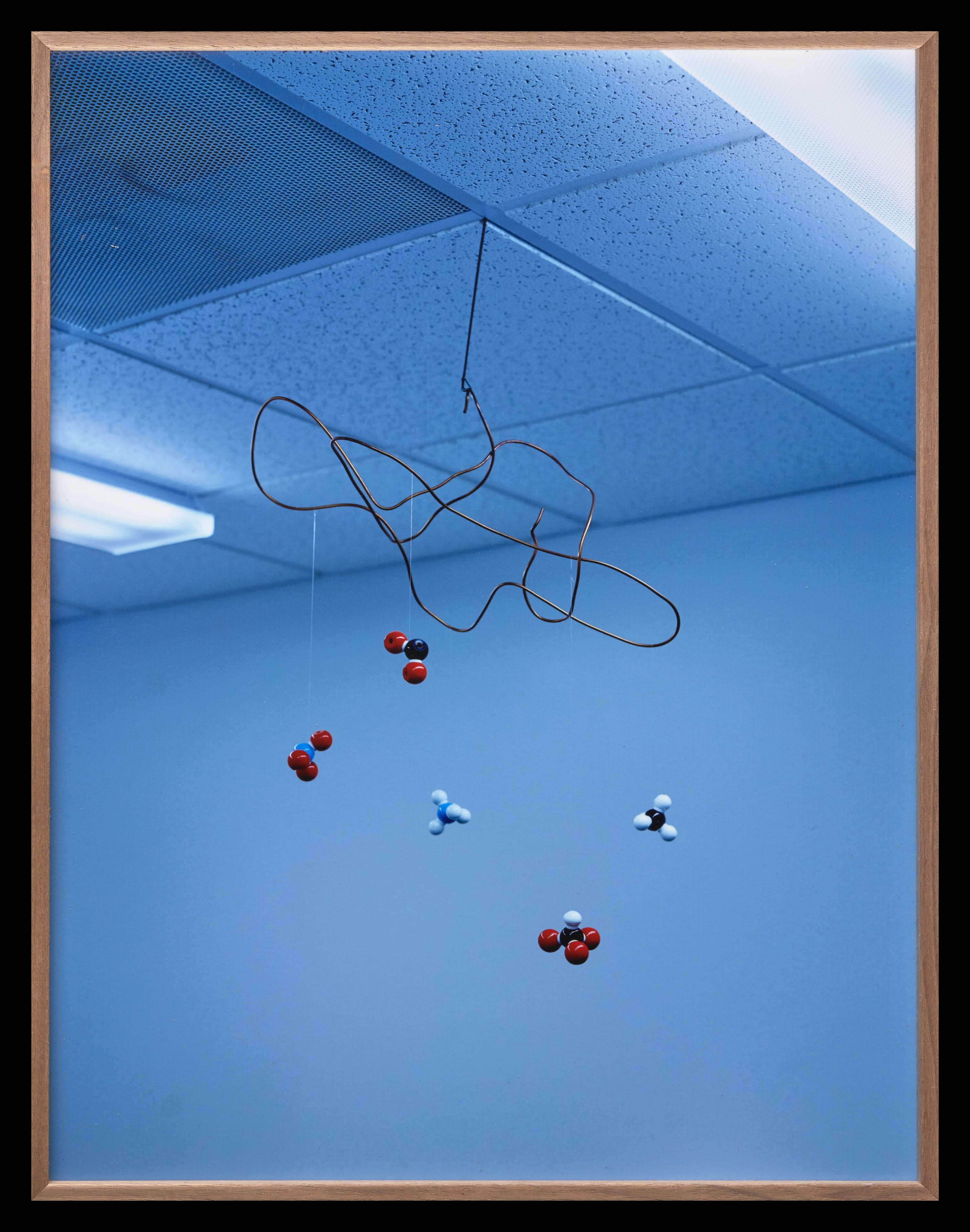 A model of plastic molecules hanging from the ceiling.