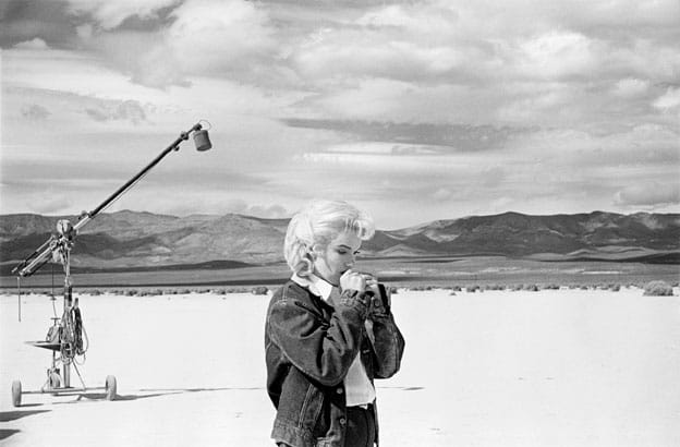 Marilyn Monroe in the Nevada desert going over her lines for a difficult scene she is about to play with Clark Gable in the film “The Misfits”, Nevada, USA, 1960 C Eve Arnold / Magnum Photos